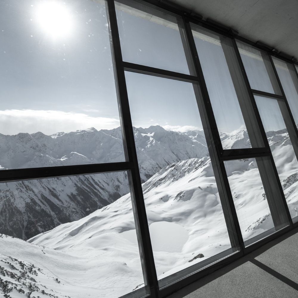 Photo of 007 Elements in Solden Austria. Image shows the snowy view out of the window from the top of a mountain.