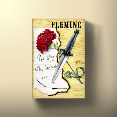 Book cover for The Spy Who Loved Me by Ian Fleming, featuring an illustration of a dagger in a note, with a red carnation.