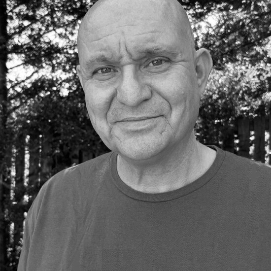 Black and white photograph of author Mike Craven, a middle aged white man.