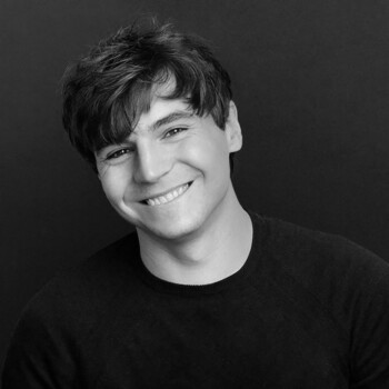 Black and white photograph of illustrator Thomas Gilbert, a white man.