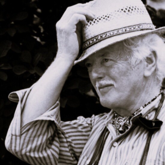 picture of an older man with a straw boater hat