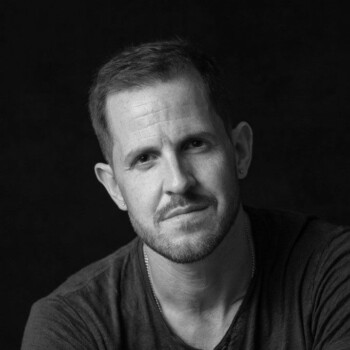 Black and white photograph of author Dan Jones.