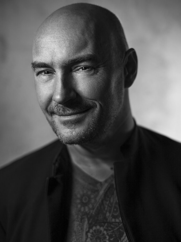 black and white headshot of Grant Morrison